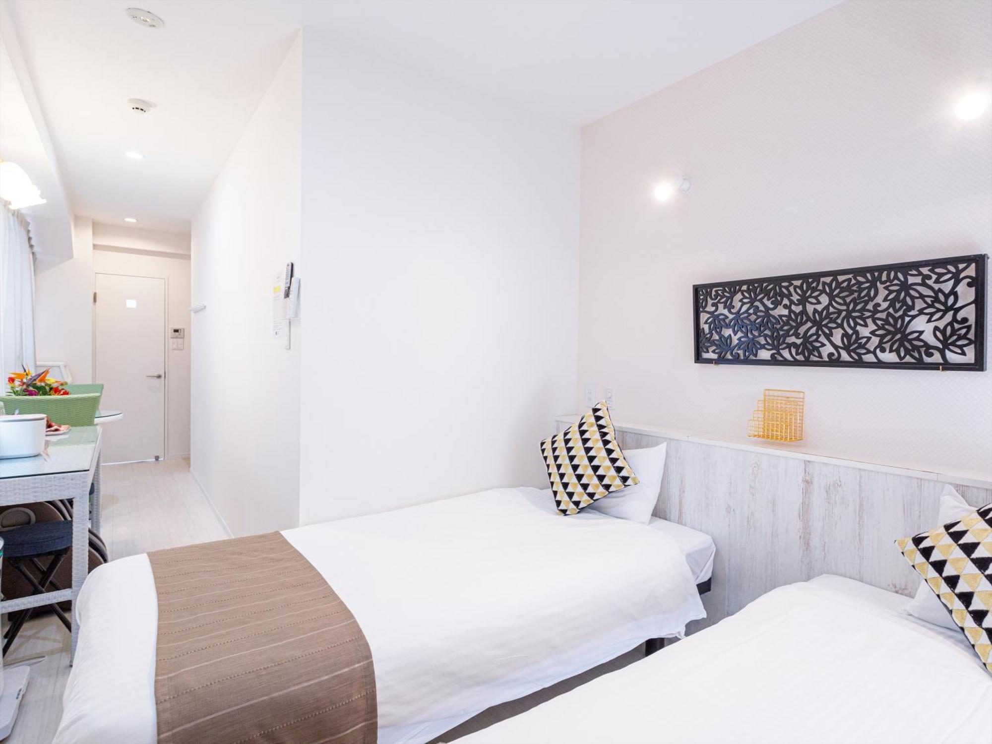 かりゆしコンドミニアムリゾート那覇スカイリビングホテル旭橋駅前 Naha Room photo